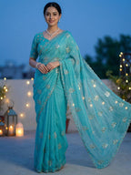 An Elegant Turquoise Chiffon Saree Adorned with Delicate Leaf Embellishments