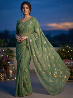 An Elegant Green Chiffon Saree Adorned with Delicate Leaf Embellishments
