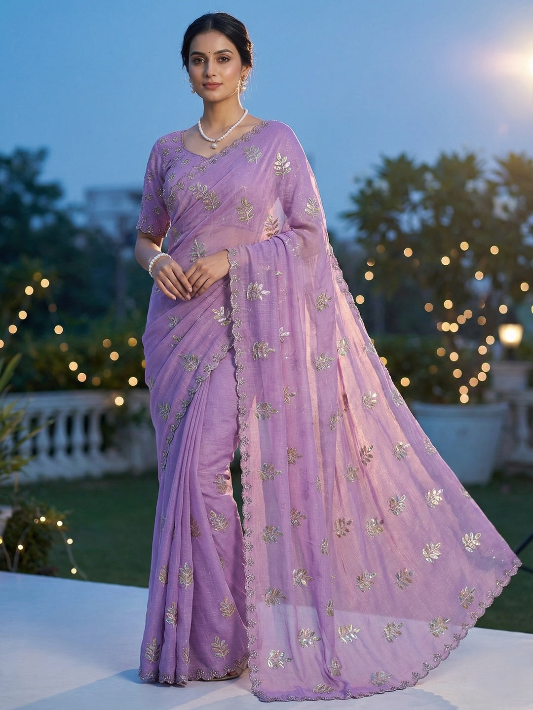 An Elegant Purple Chiffon Saree Adorned with Delicate Leaf Embellishments
