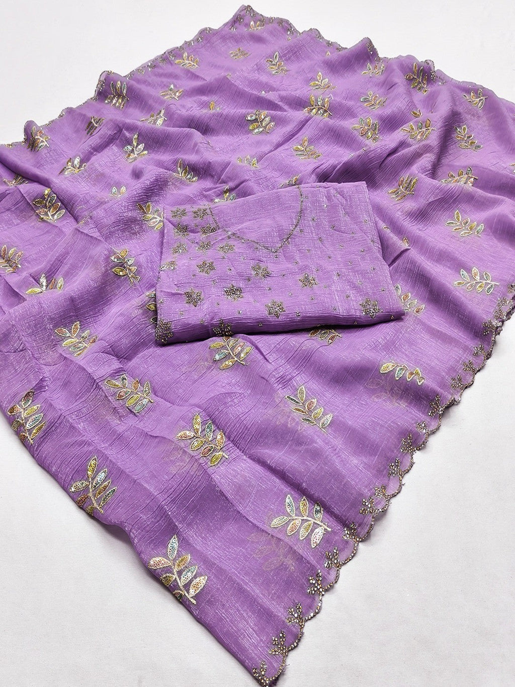 An Elegant Purple Chiffon Saree Adorned with Delicate Leaf Embellishments