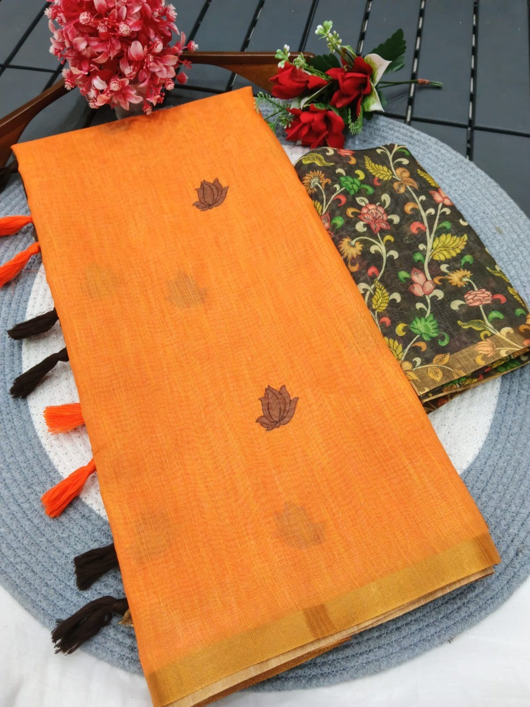 Graceful Orange Linen Saree with Beautiful Floral Printed Border
