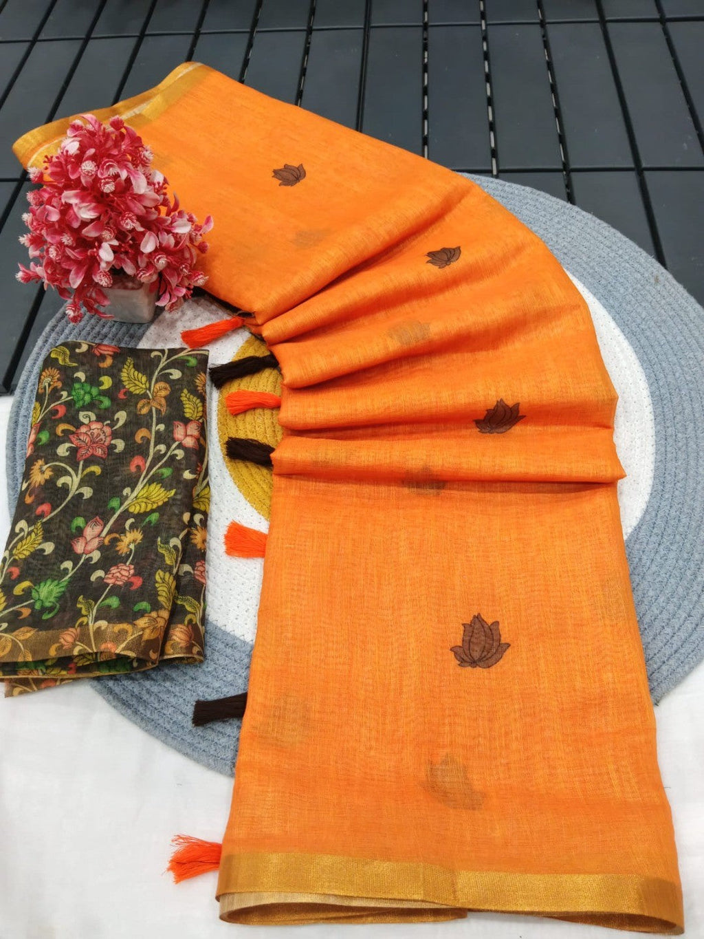 Graceful Orange Linen Saree with Beautiful Floral Printed Border