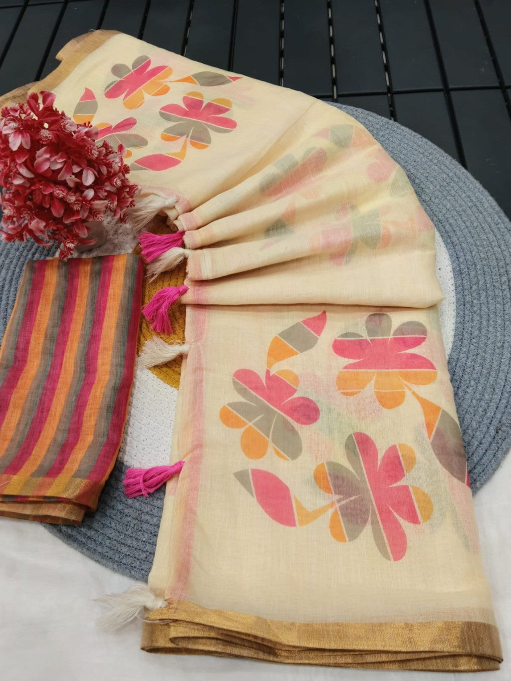 Stylish Cream Linen Saree with Beautiful Floral Print & Rich Golden Border