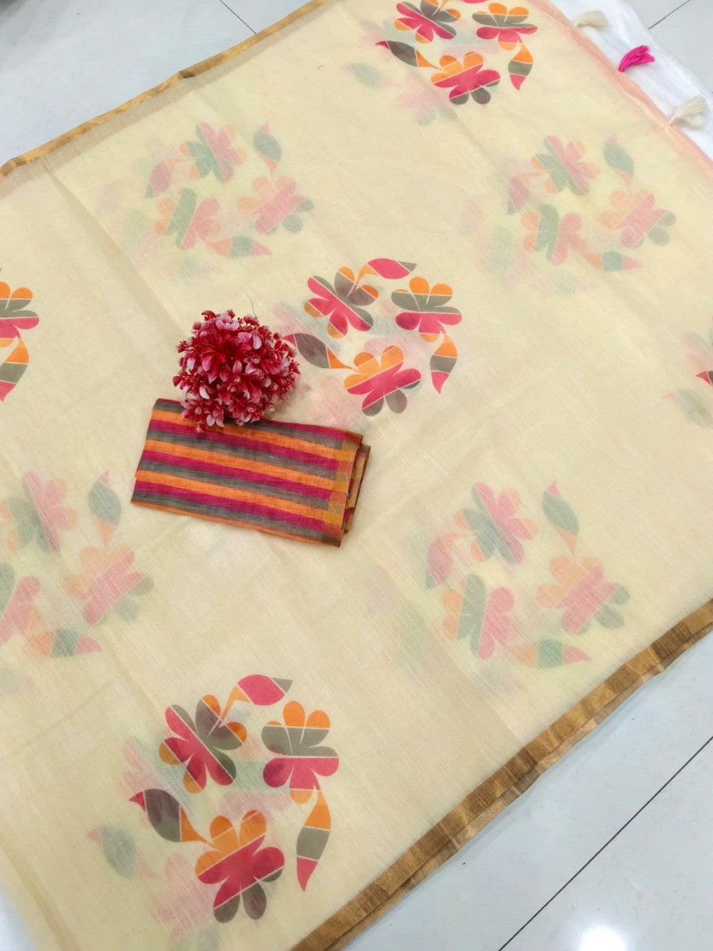 Stylish Cream Linen Saree with Beautiful Floral Print & Rich Golden Border
