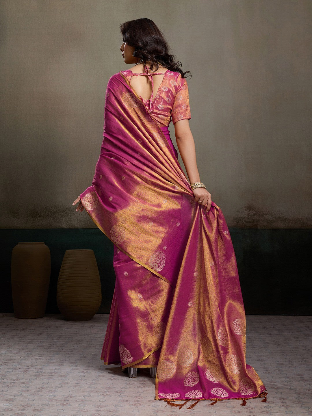 Stylish Magenta Tissue Saree with Fine Woven Floral Patterns and Glossy Finish