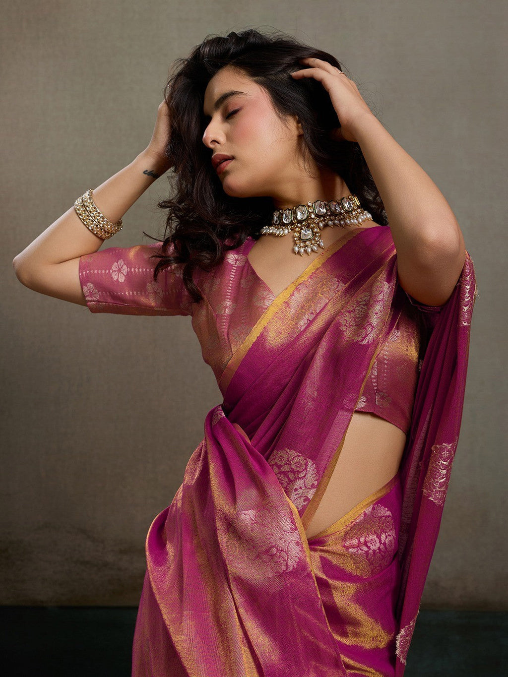 Stylish Magenta Tissue Saree with Fine Woven Floral Patterns and Glossy Finish