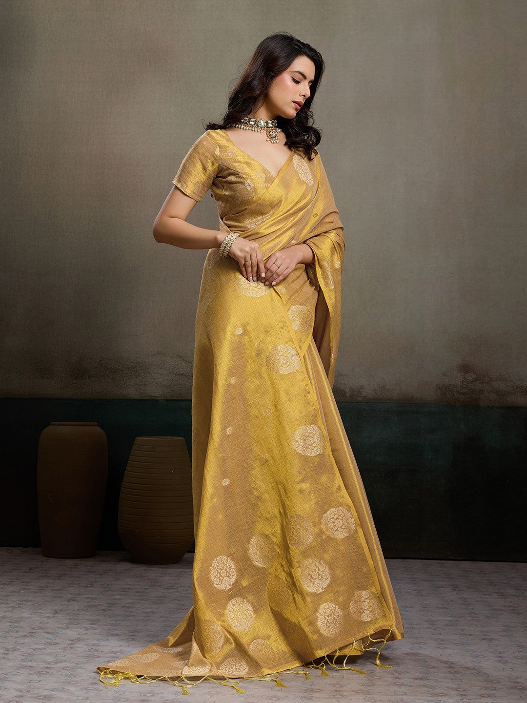 Stylish Beige Tissue Saree with Fine Woven Floral Patterns and Glossy Finish