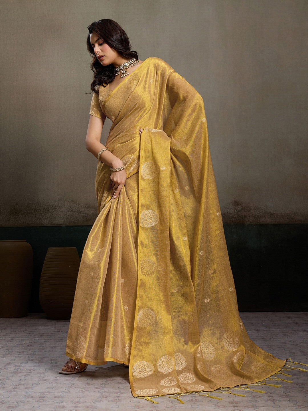 Stylish Beige Tissue Saree with Fine Woven Floral Patterns and Glossy Finish