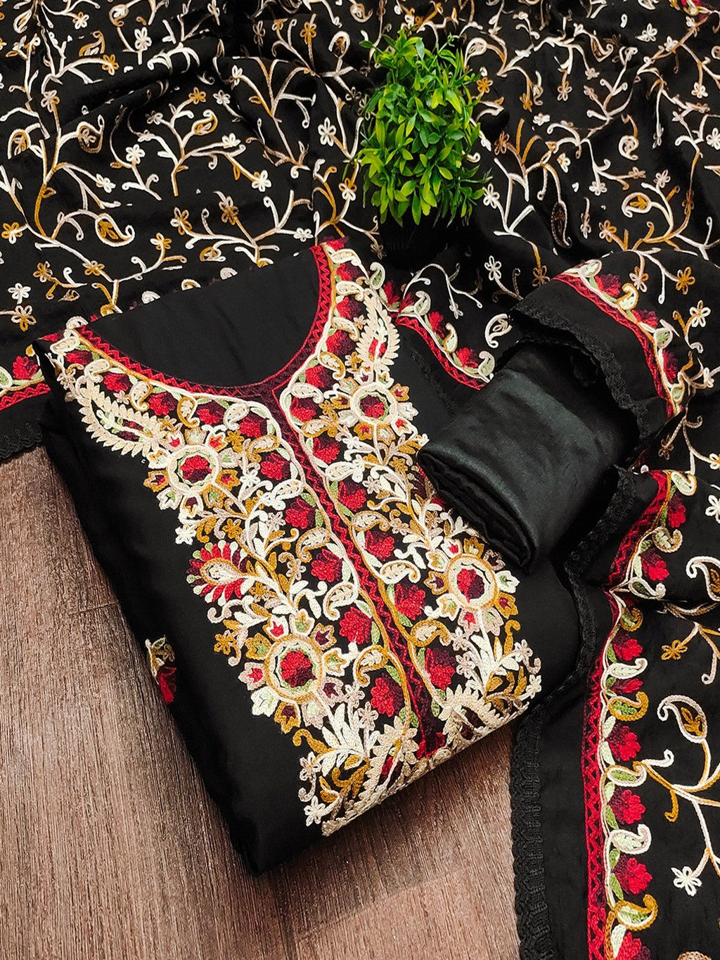Ethnic Black Roman Art Silk Dress Material Highlighted With Floral & Paisley Thread Embroidery