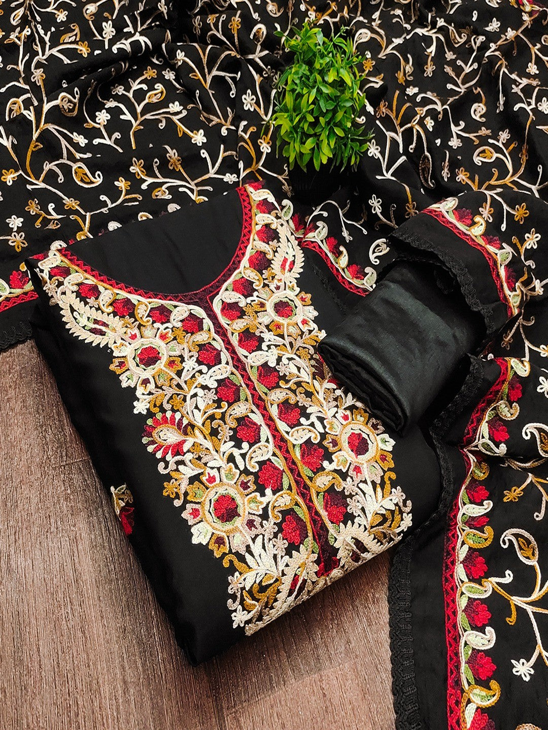 Ethnic Black Roman Art Silk Dress Material Highlighted With Floral & Paisley Thread Embroidery