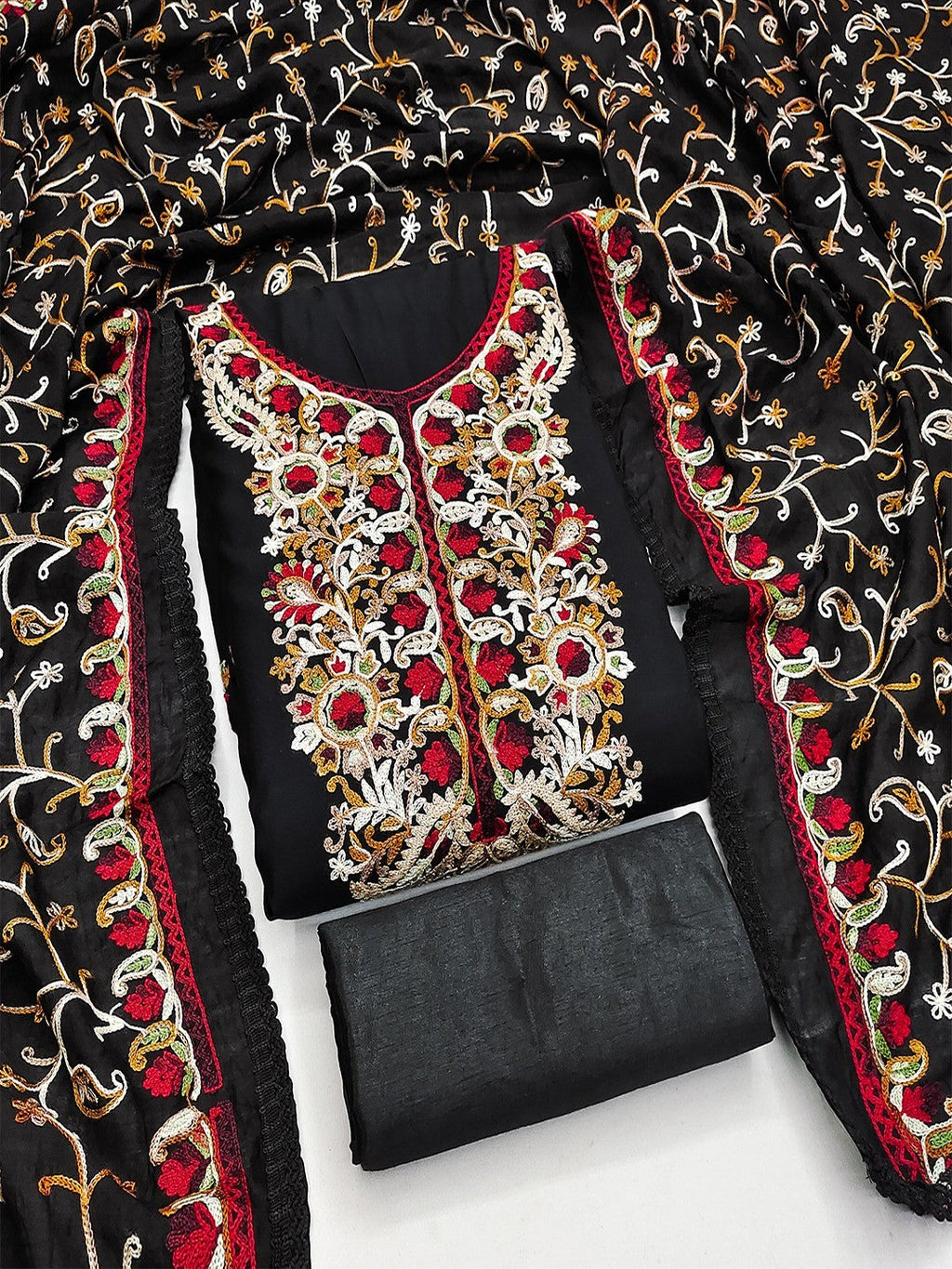 Ethnic Black Roman Art Silk Dress Material Highlighted With Floral & Paisley Thread Embroidery