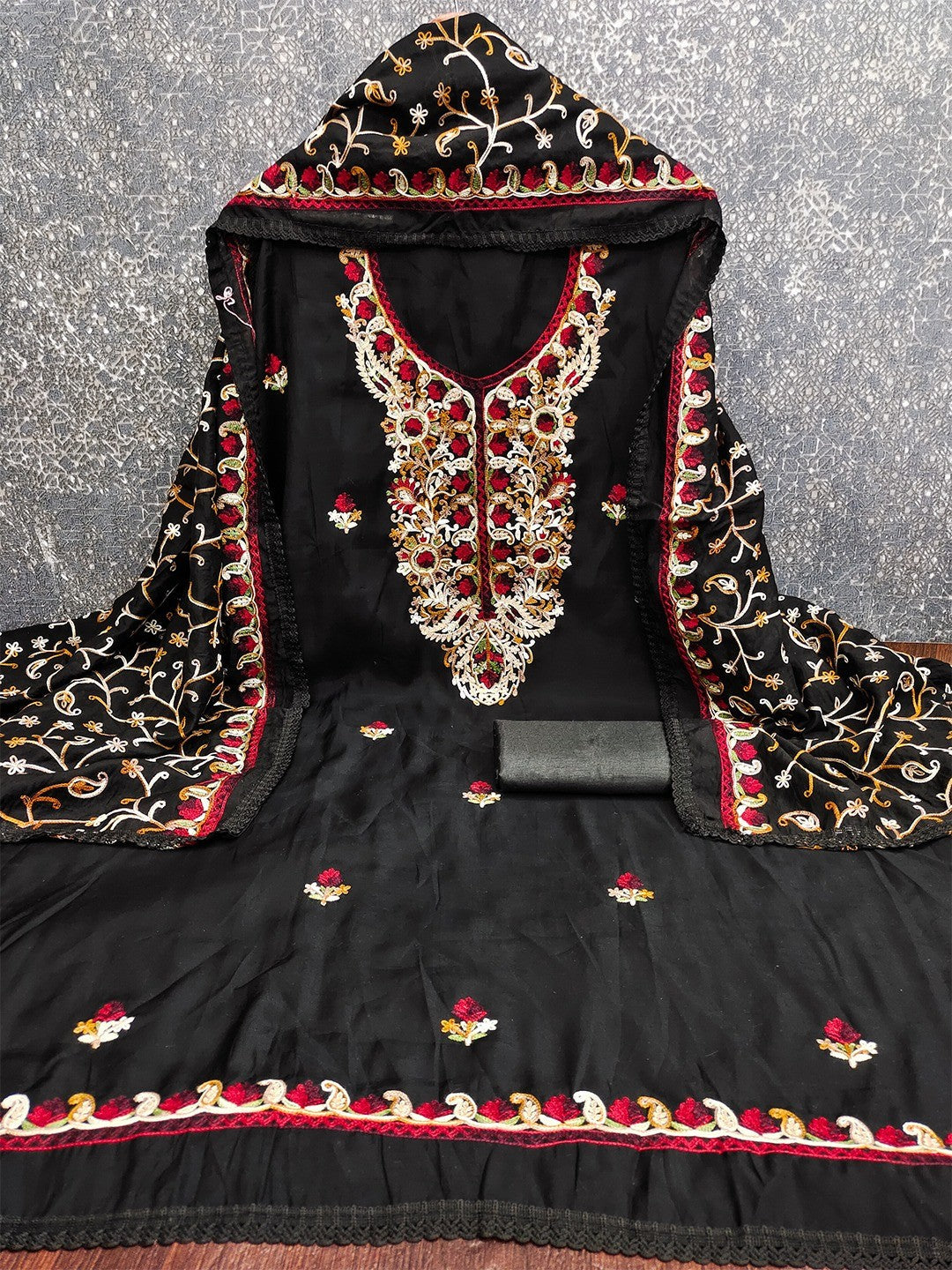 Ethnic Black Roman Art Silk Dress Material Highlighted With Floral & Paisley Thread Embroidery