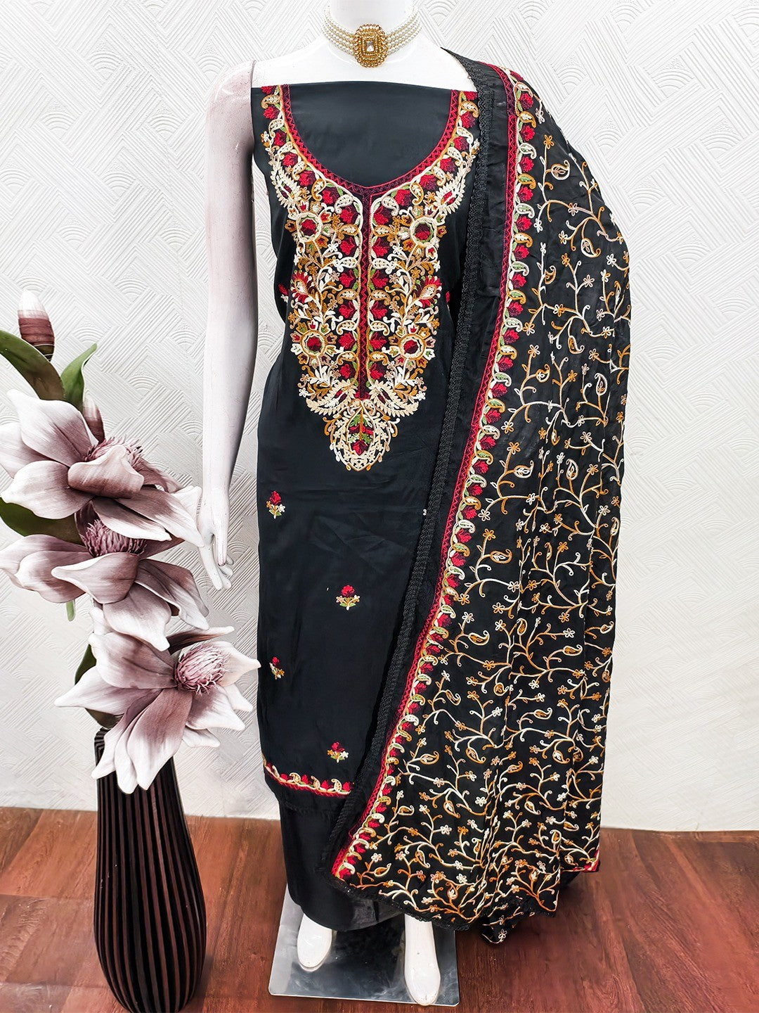 Ethnic Black Roman Art Silk Dress Material Highlighted With Floral & Paisley Thread Embroidery