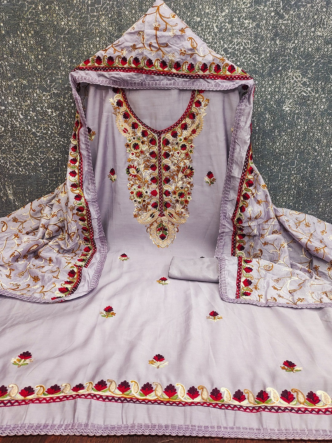 Ethnic Lavender Roman Art Silk Dress Material Highlighted With Floral & Paisley Thread Embroidery