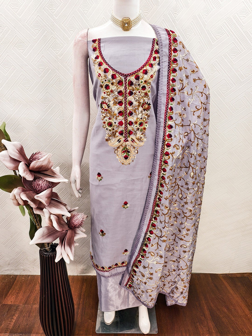 Ethnic Lavender Roman Art Silk Dress Material Highlighted With Floral & Paisley Thread Embroidery