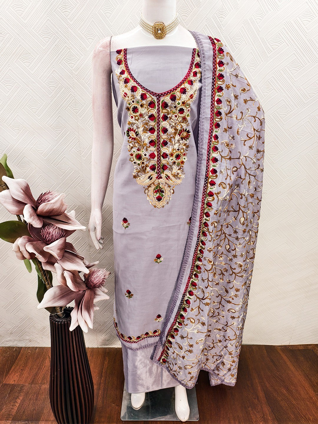 Ethnic Lavender Roman Art Silk Dress Material Highlighted With Floral & Paisley Thread Embroidery
