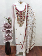 Ethnic Offwhite Roman Art Silk Dress Material Highlighted With Floral & Paisley Thread Embroidery