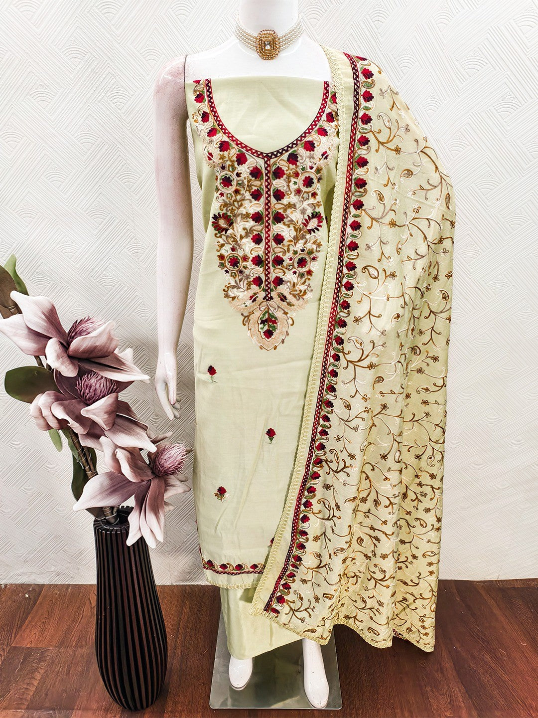 Ethnic Pista Green Roman Art Silk Dress Material Highlighted With Floral & Paisley Thread Embroidery