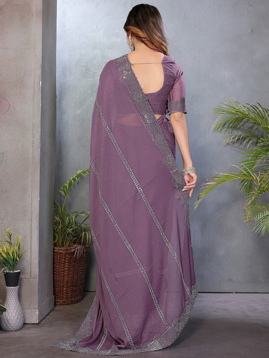 Designer Purple Star Georgette Saree Featuring Intricate Swarovski Embellishment Work