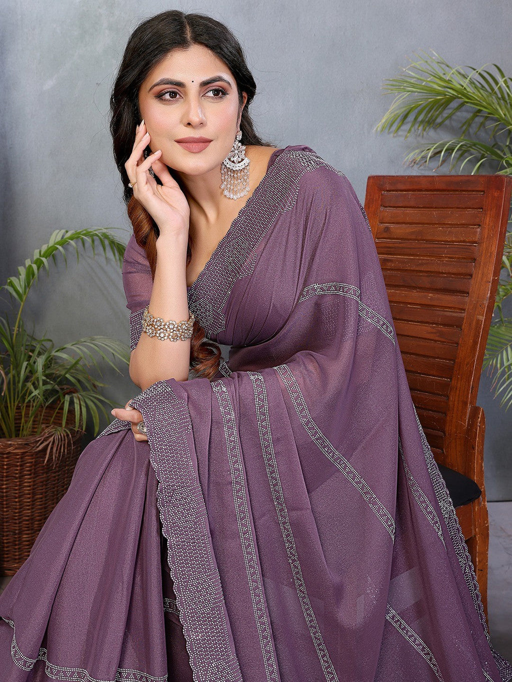 Designer Purple Star Georgette Saree Featuring Intricate Swarovski Embellishment Work