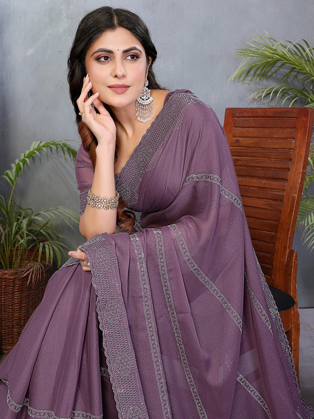 Designer Purple Star Georgette Saree Featuring Intricate Swarovski Embellishment Work