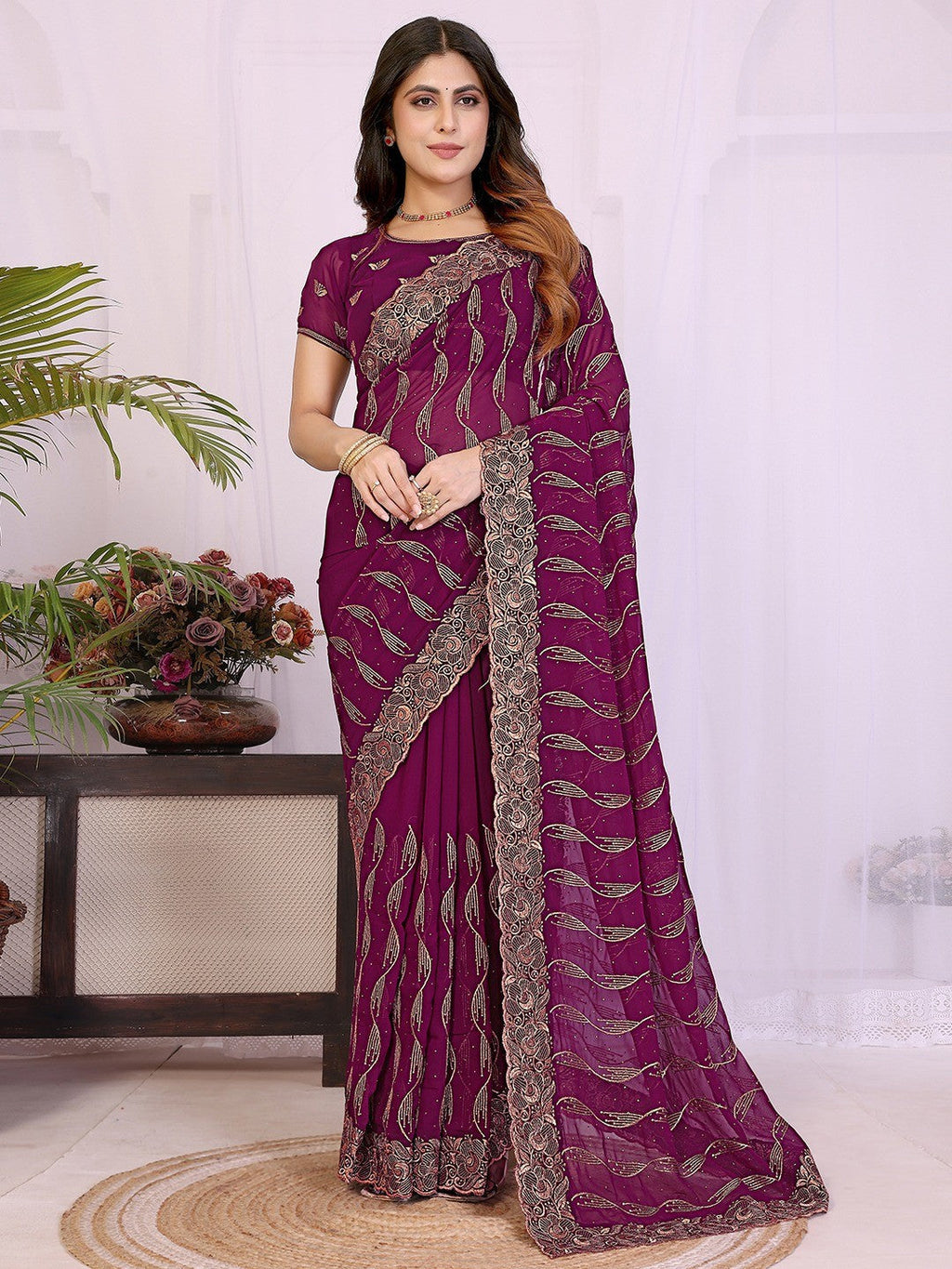 Sophisticated Wine Floral Zari Work Star Georgette Saree With Swarovski Embellishment