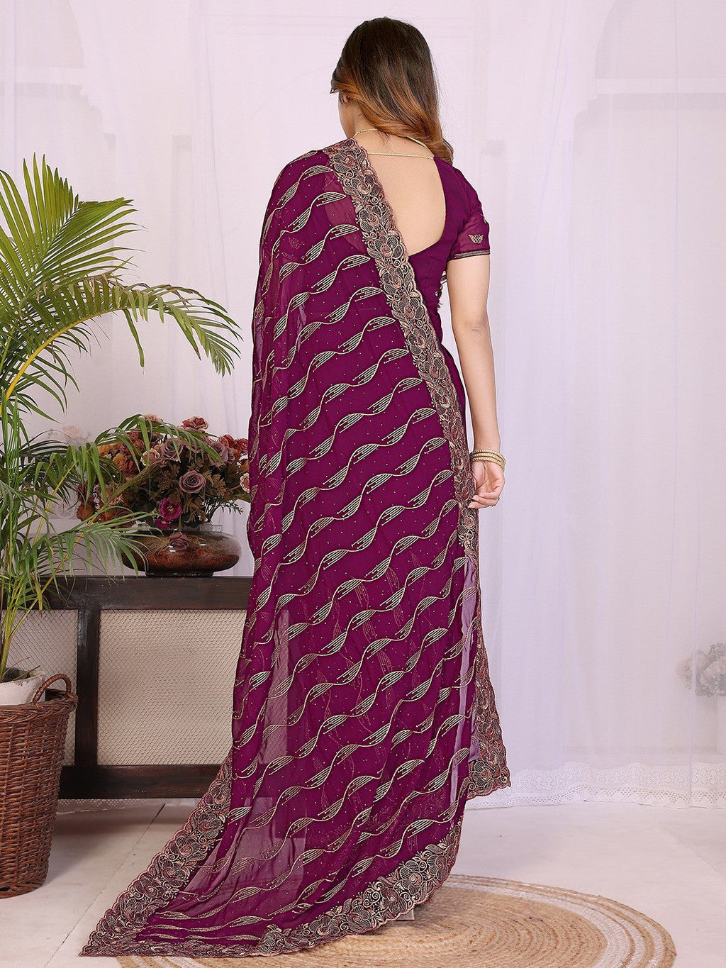 Sophisticated Wine Floral Zari Work Star Georgette Saree With Swarovski Embellishment
