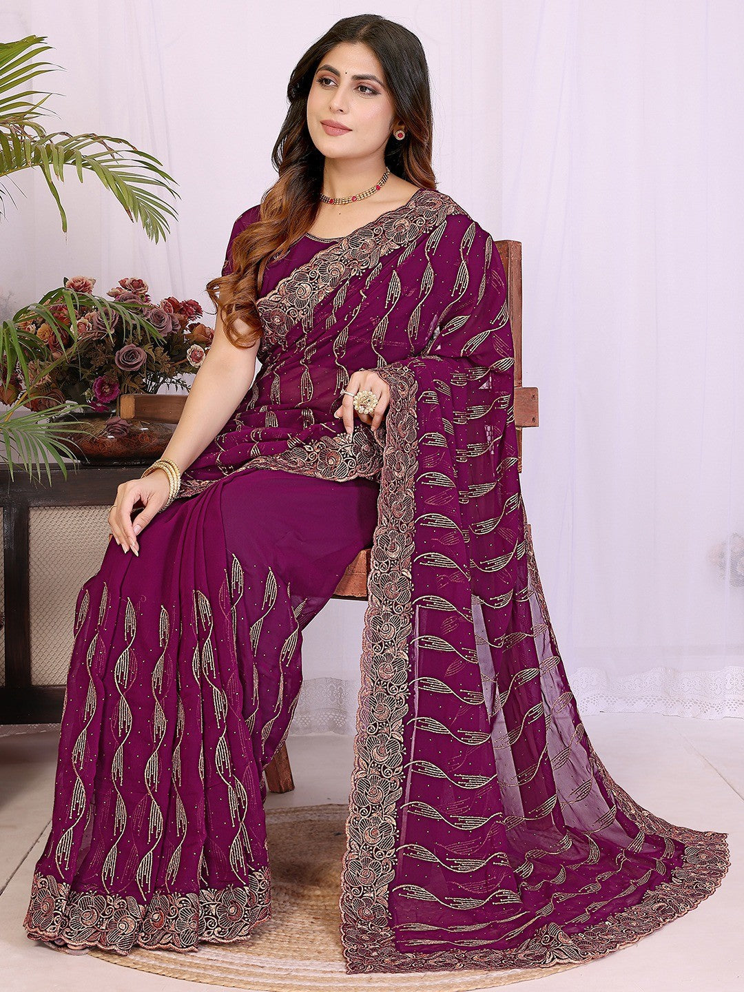 Sophisticated Wine Floral Zari Work Star Georgette Saree With Swarovski Embellishment