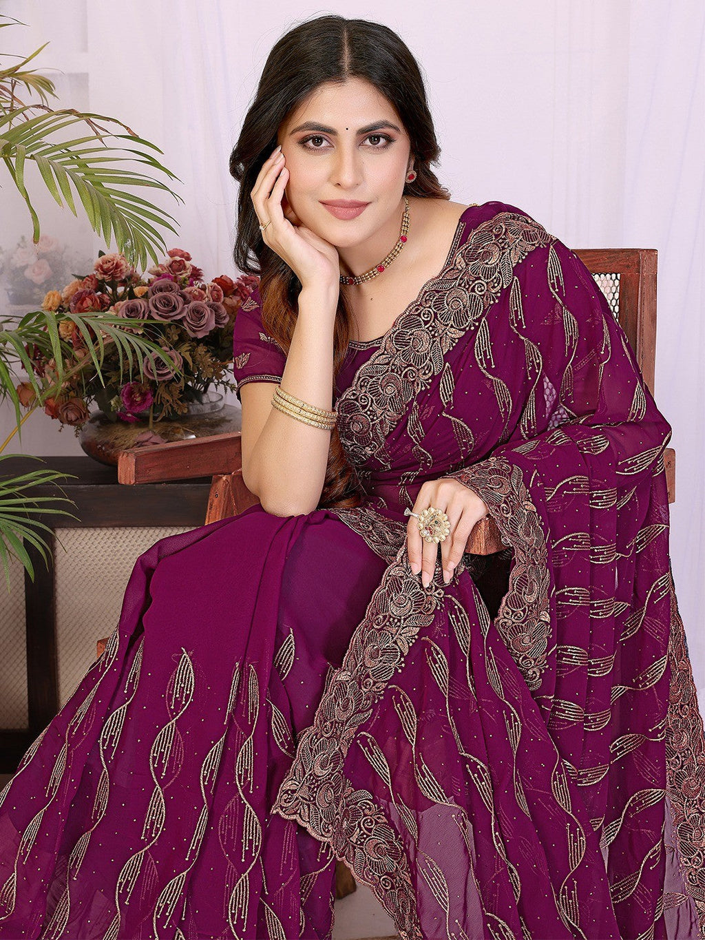 Sophisticated Wine Floral Zari Work Star Georgette Saree With Swarovski Embellishment