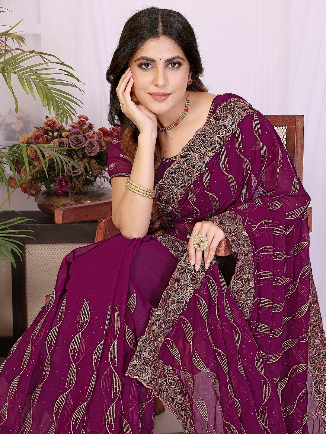 Sophisticated Wine Floral Zari Work Star Georgette Saree With Swarovski Embellishment