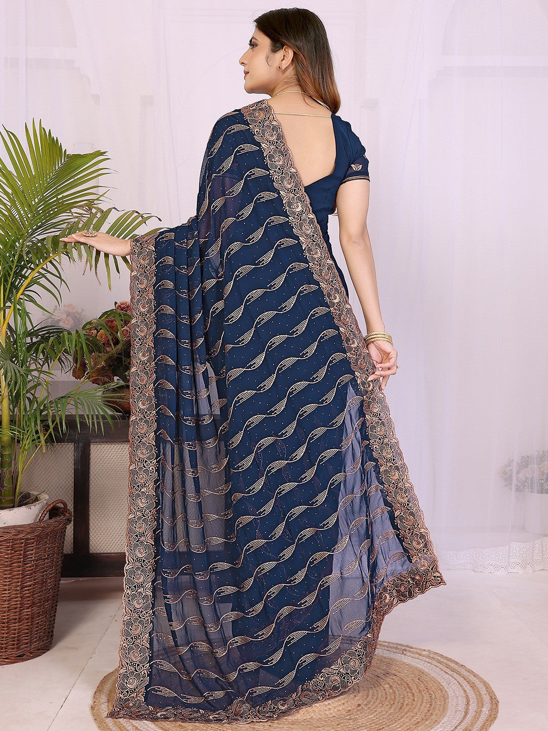 Sophisticated Navy Blue Floral Zari Work Star Georgette Saree With Swarovski Embellishment