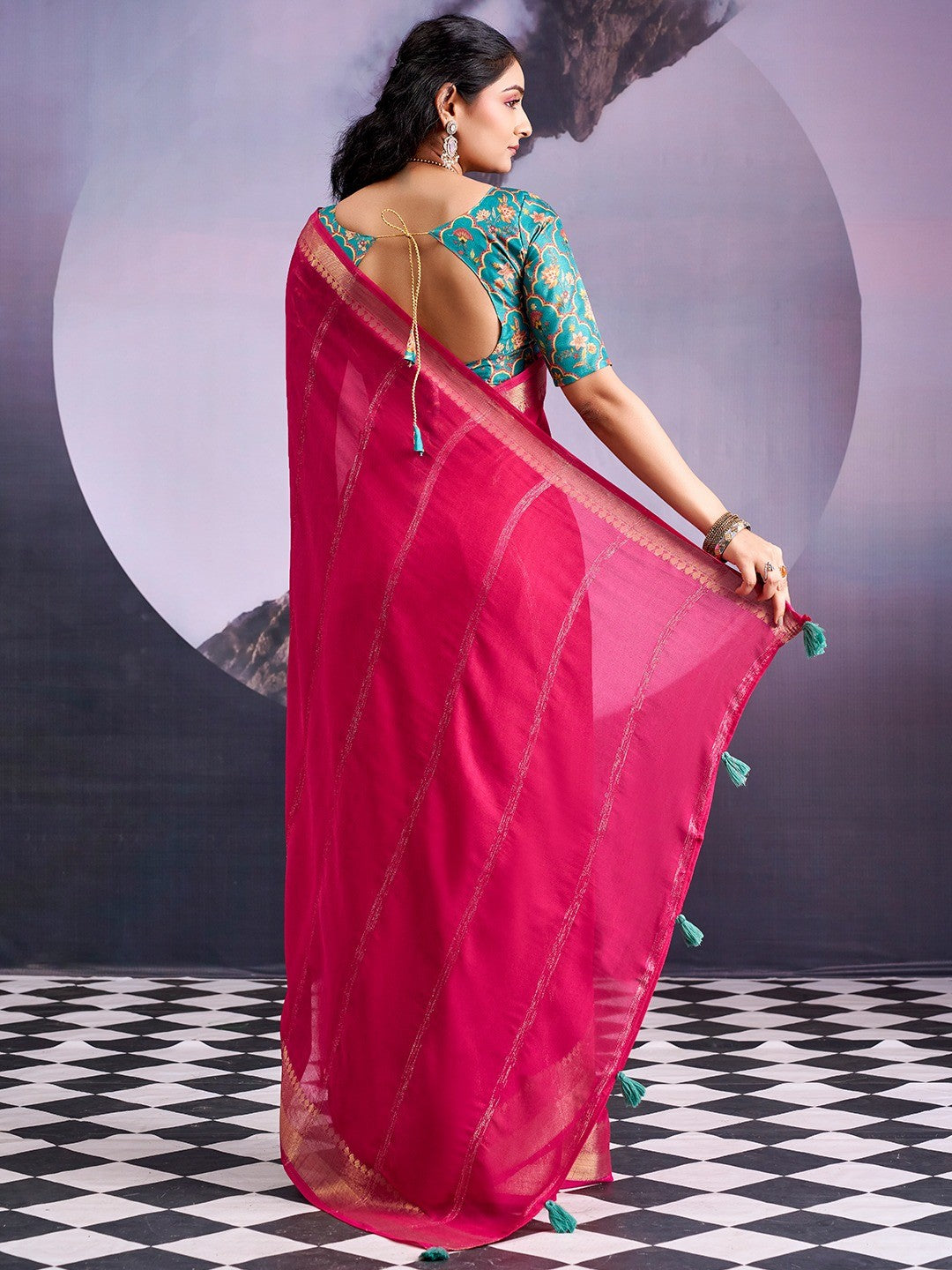 Charming Pink Striped Zari Woven Georgette Saree With Graceful Tassel Finish