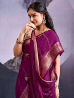 Charming Wine Striped Zari Woven Georgette Saree With Graceful Tassel Finish