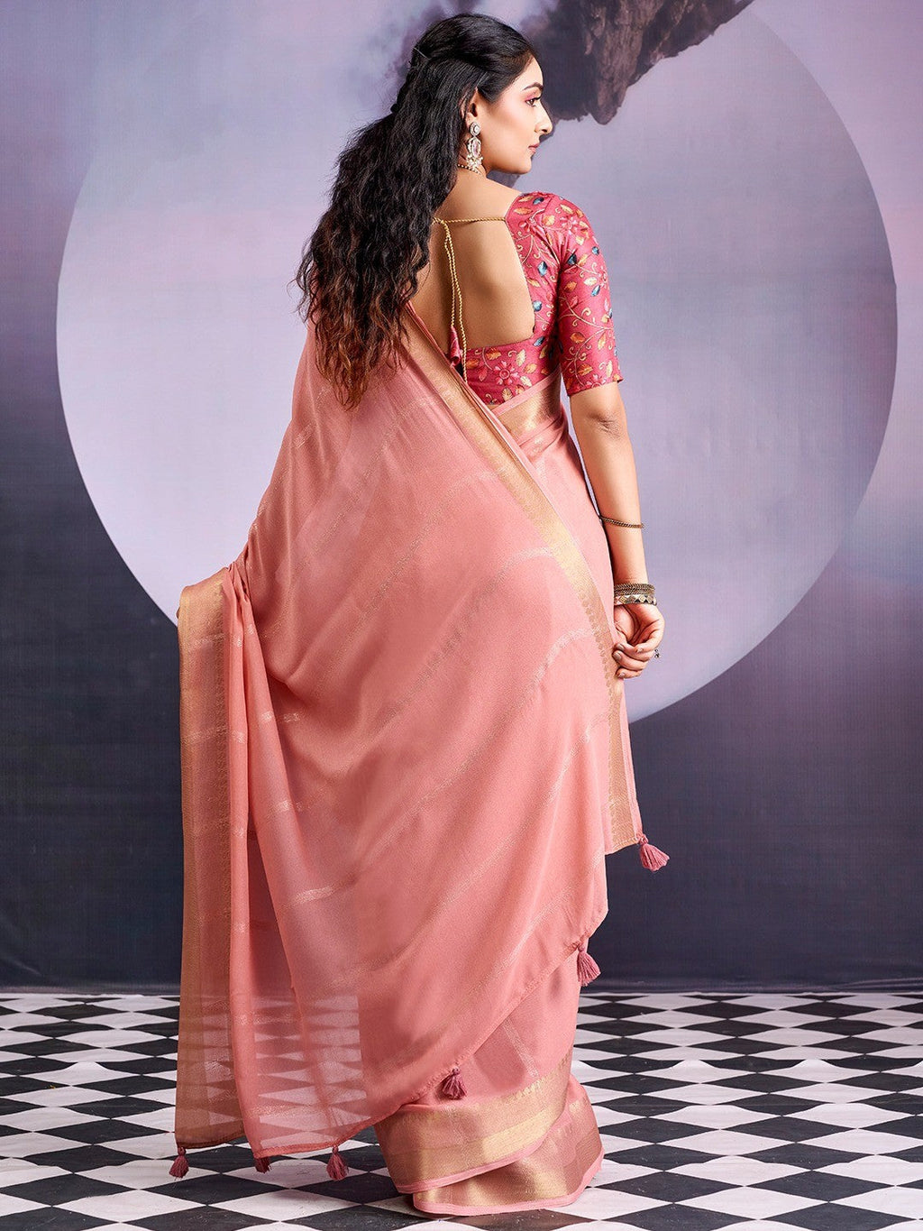 Charming Peach Striped Zari Woven Georgette Saree With Graceful Tassel Finish