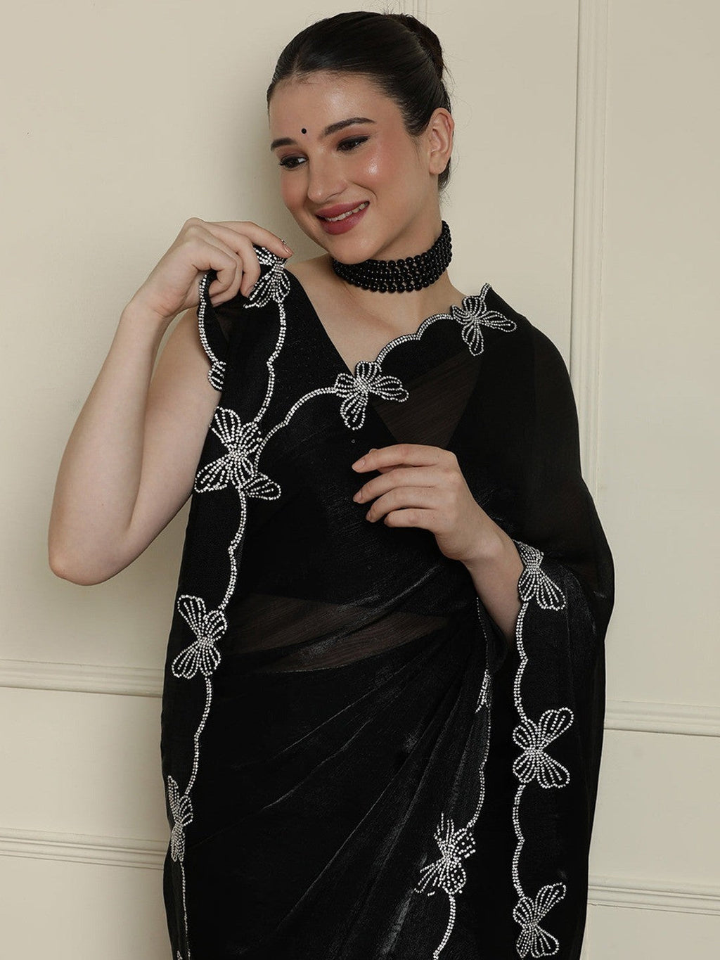 Elegant Black Satin Saree with Delicate Embellished Border
