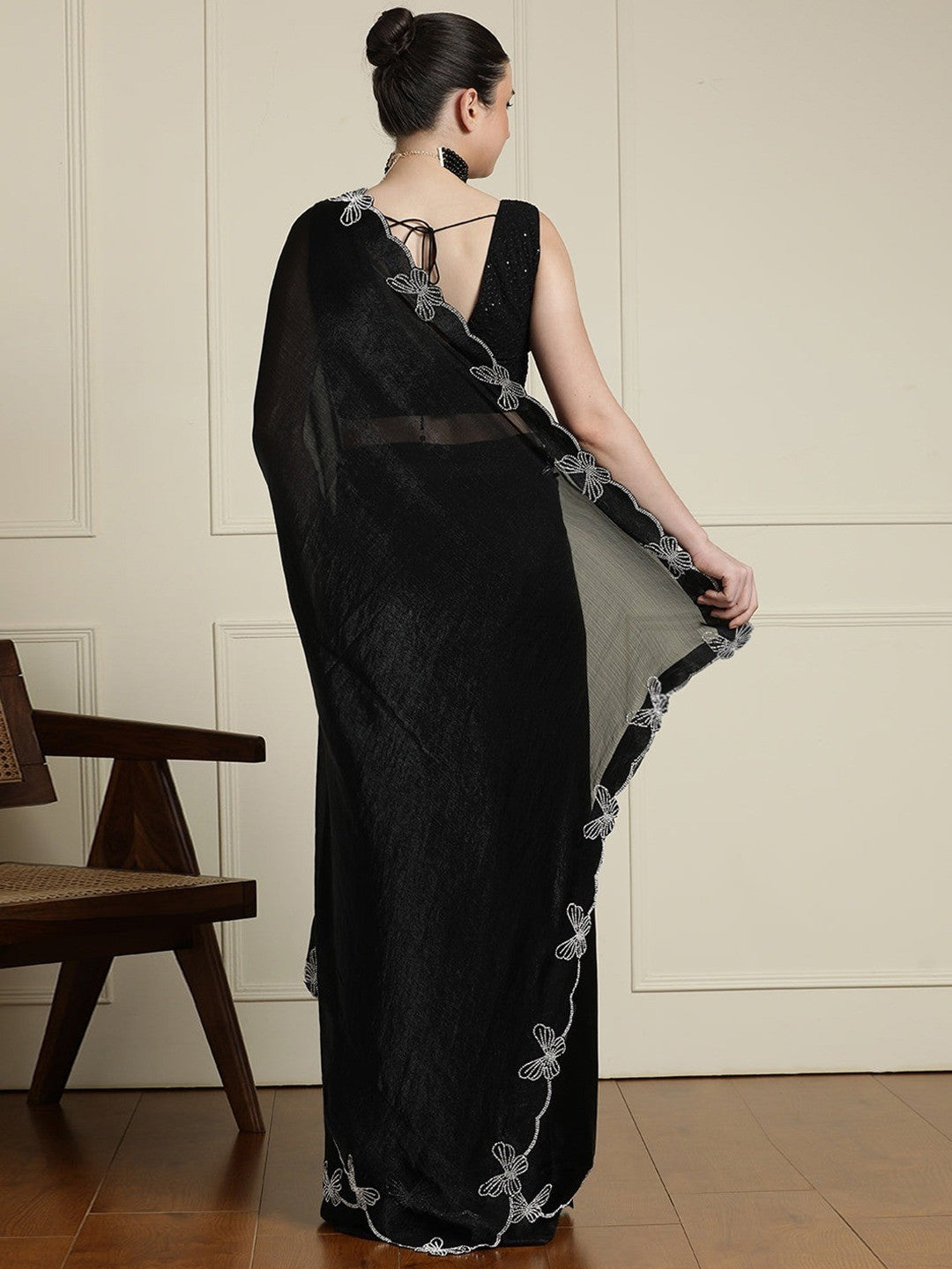 Elegant Black Satin Saree with Delicate Embellished Border