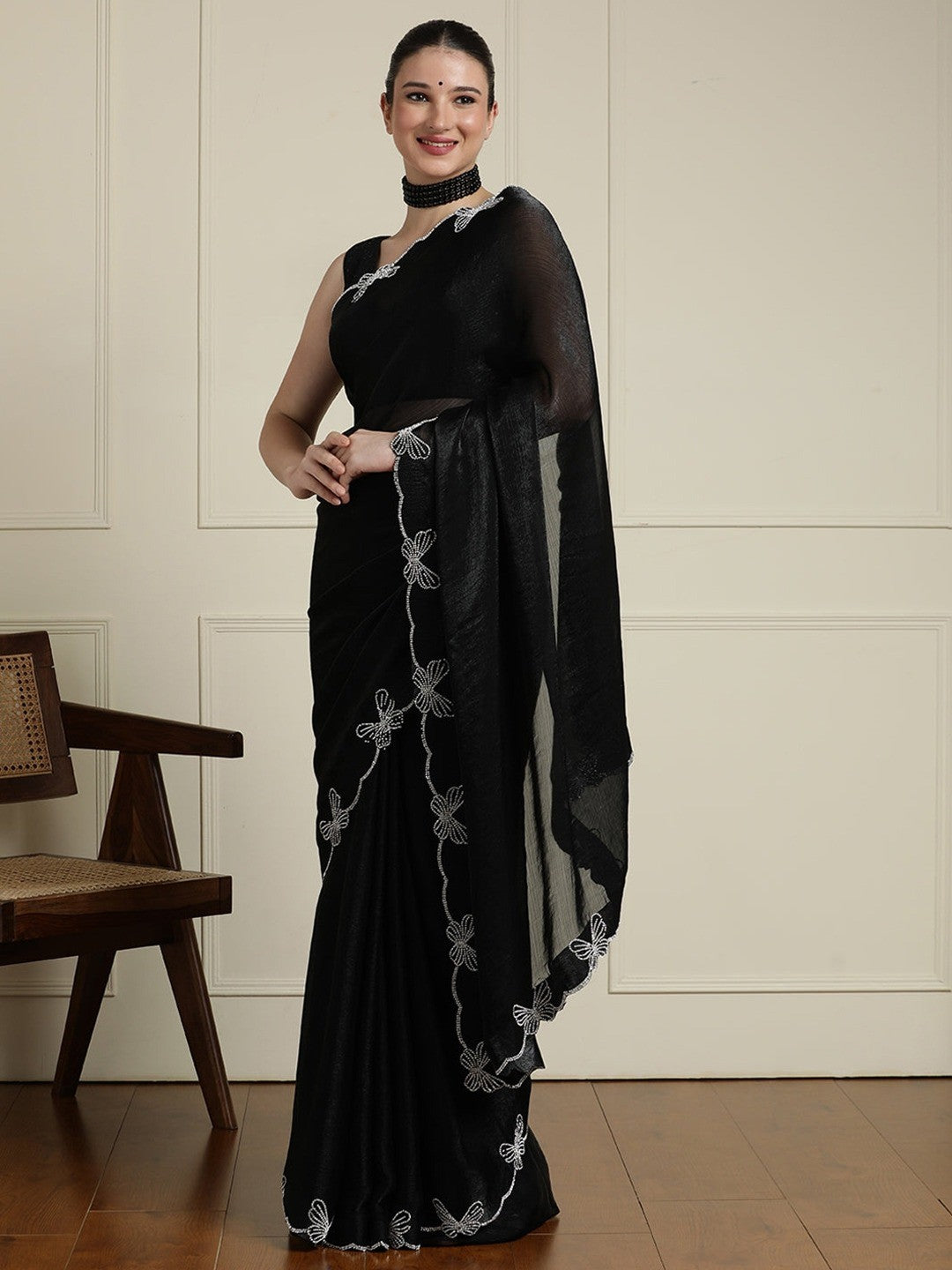 Elegant Black Satin Saree with Delicate Embellished Border
