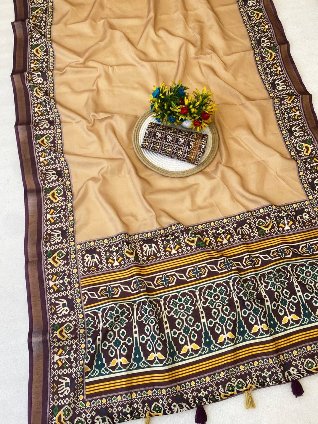 Minimal Chikoo Mulmul Cotton Saree with Subtle Ajrakh Border and Airy Texture