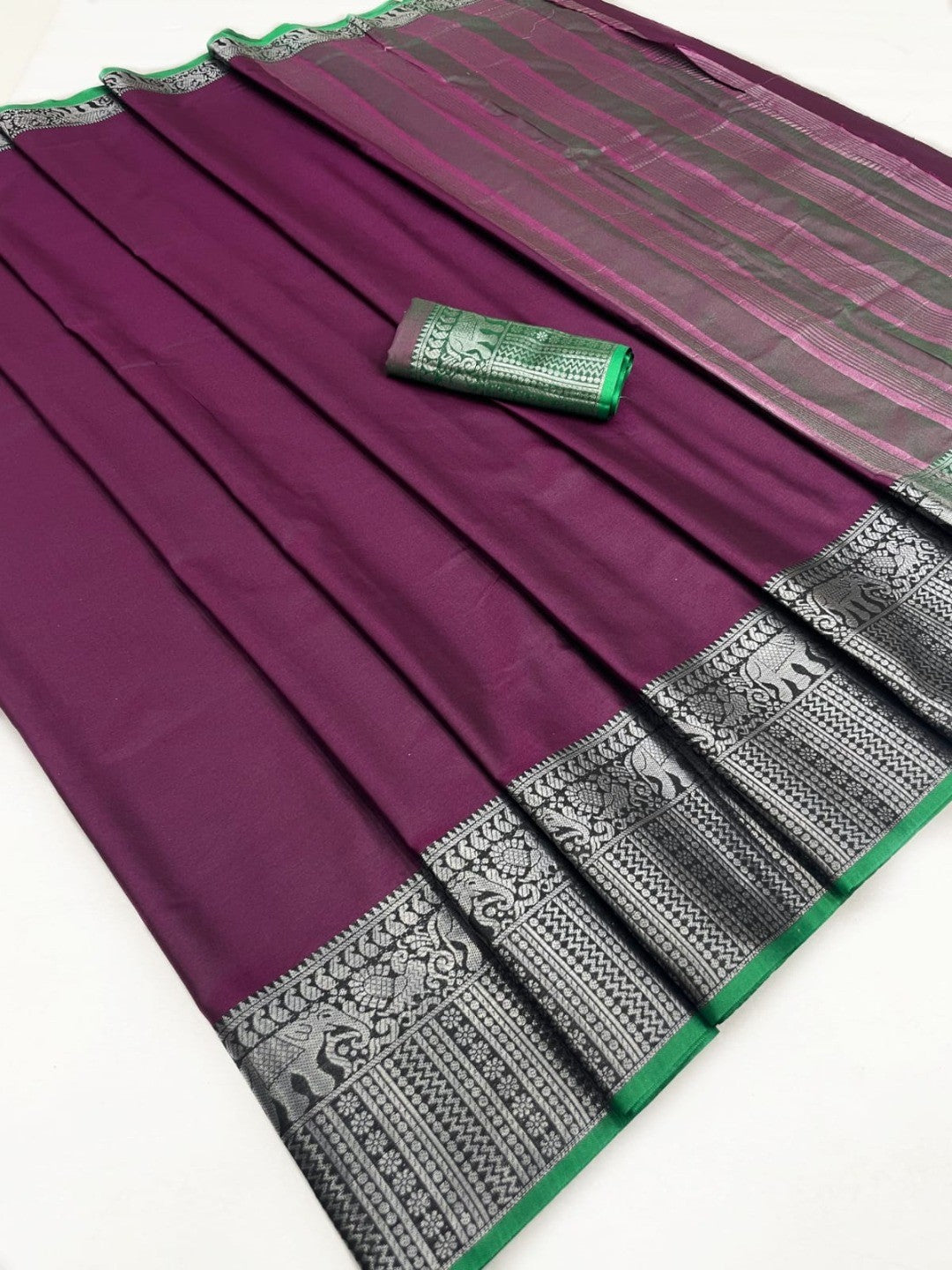 Classic Wine Plain Saree Highlighted With Silver Zari Woven Border Work