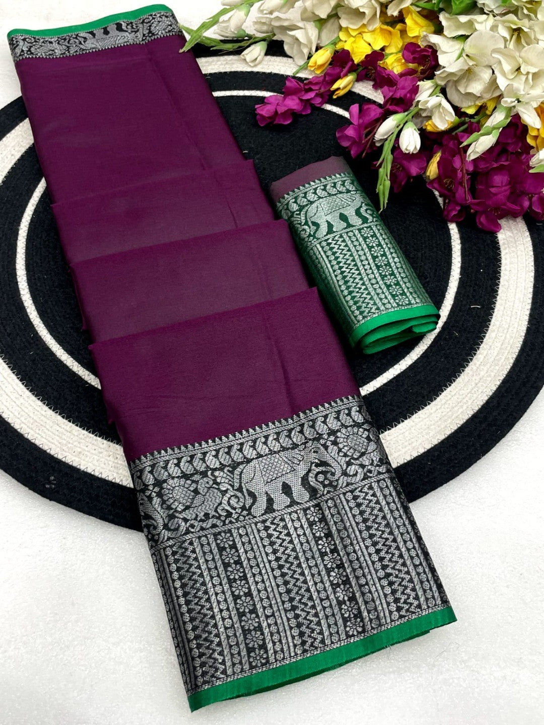 Classic Wine Plain Saree Highlighted With Silver Zari Woven Border Work