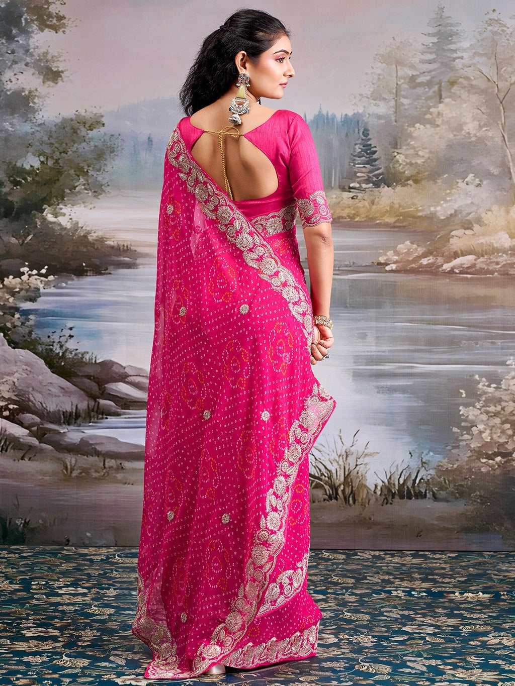 Graceful Pink Bandhani Print Georgette Saree Highlighted With Floral Embroidery Work Border