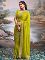 Graceful Green Bandhani Print Georgette Saree Highlighted With Floral Embroidery Work Border