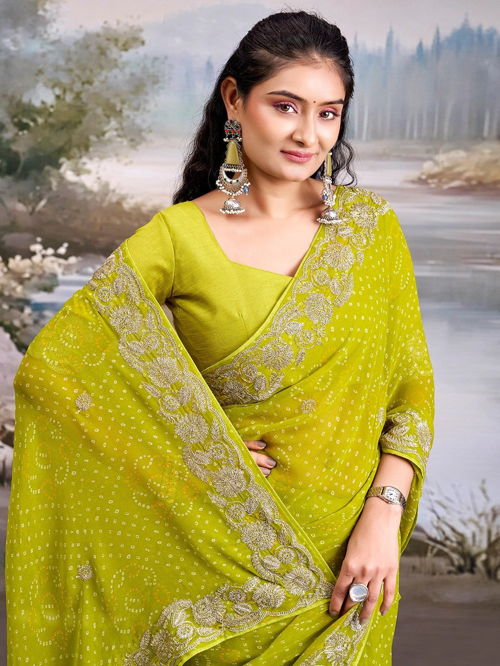 Graceful Green Bandhani Print Georgette Saree Highlighted With Floral Embroidery Work Border