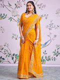 Graceful Mustard Bandhani Print Georgette Saree Highlighted With Floral Embroidery Work Border