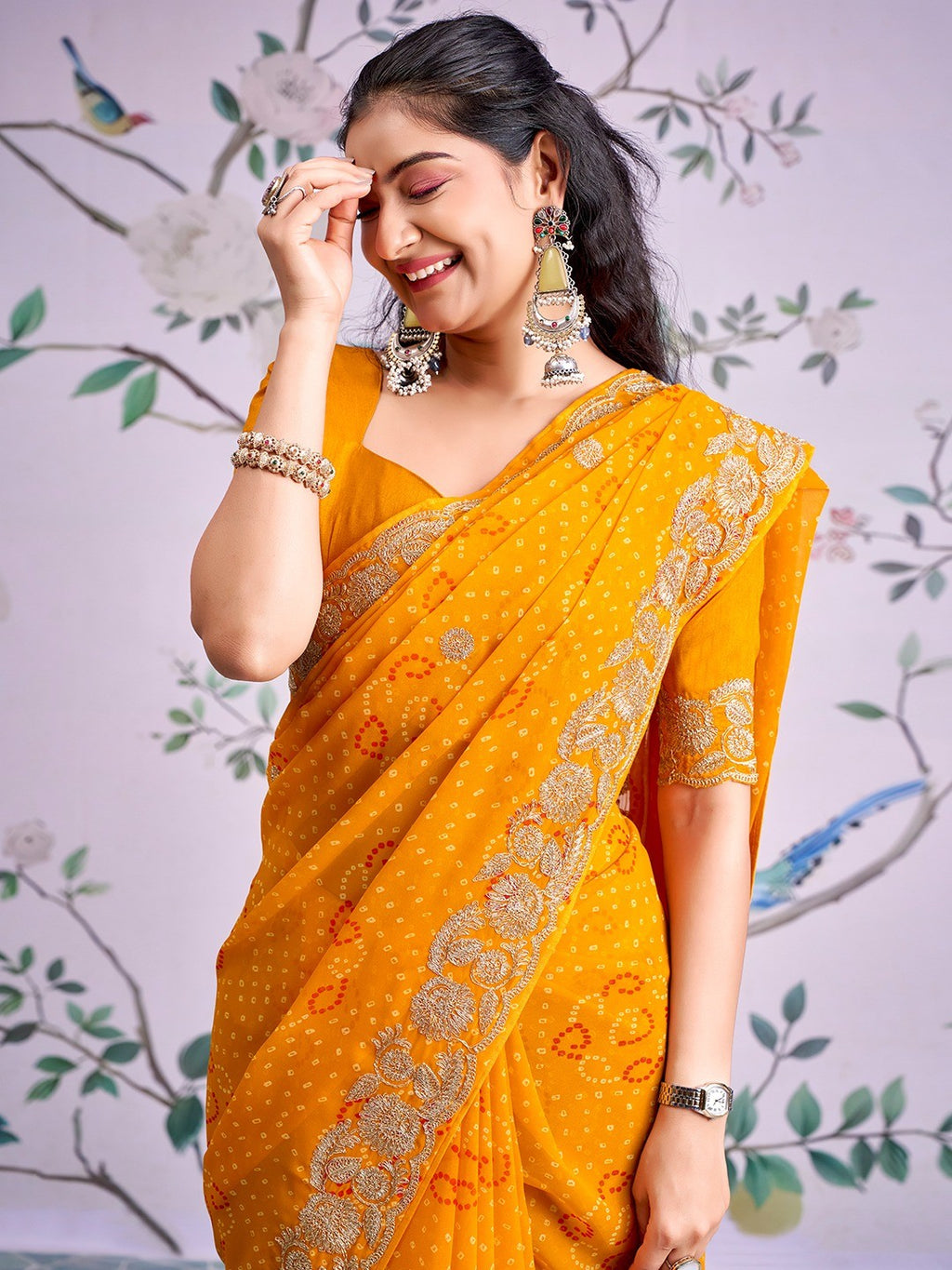 Graceful Mustard Bandhani Print Georgette Saree Highlighted With Floral Embroidery Work Border