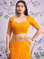 Graceful Mustard Bandhani Print Georgette Saree Highlighted With Floral Embroidery Work Border