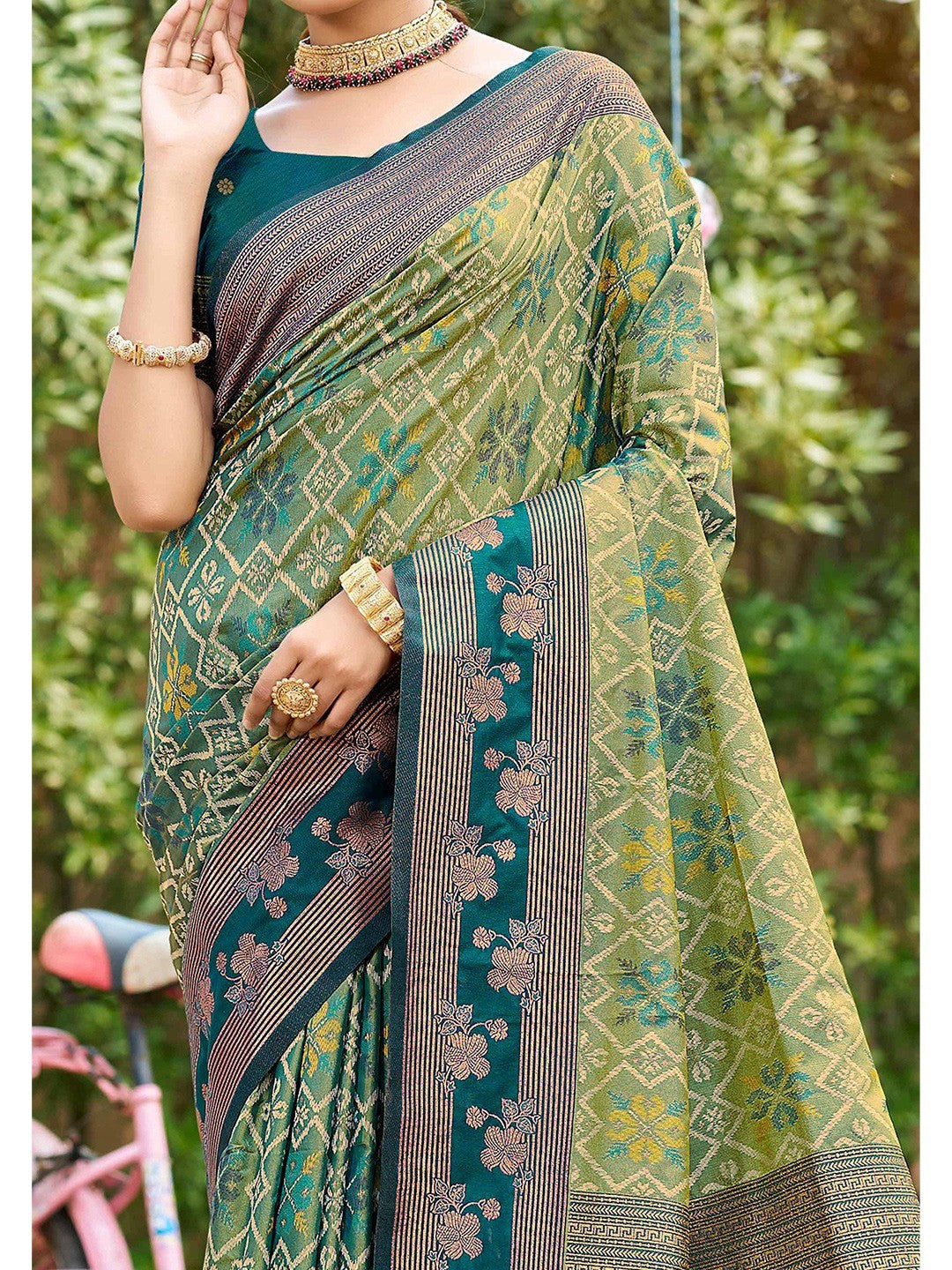 Ethnic Teal Green Floral & Geometric Zari Weaving Silk Blend Saree With Tassels Pallu