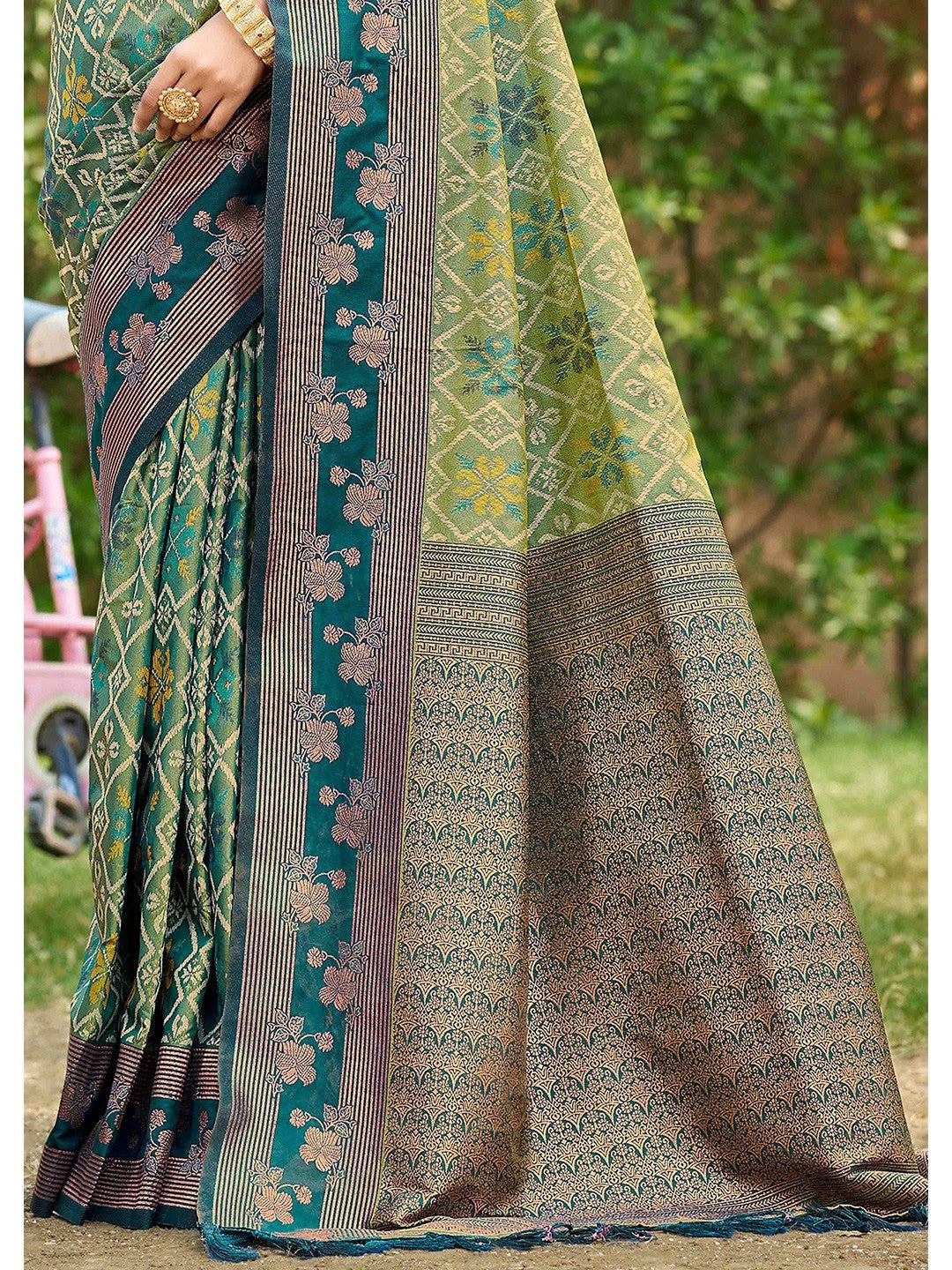 Ethnic Teal Green Floral & Geometric Zari Weaving Silk Blend Saree With Tassels Pallu