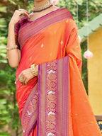 Classic Coral Orange Floral & Peacock Design Zari Woven Silk Blend Saree With Trendy Tassel Pallu