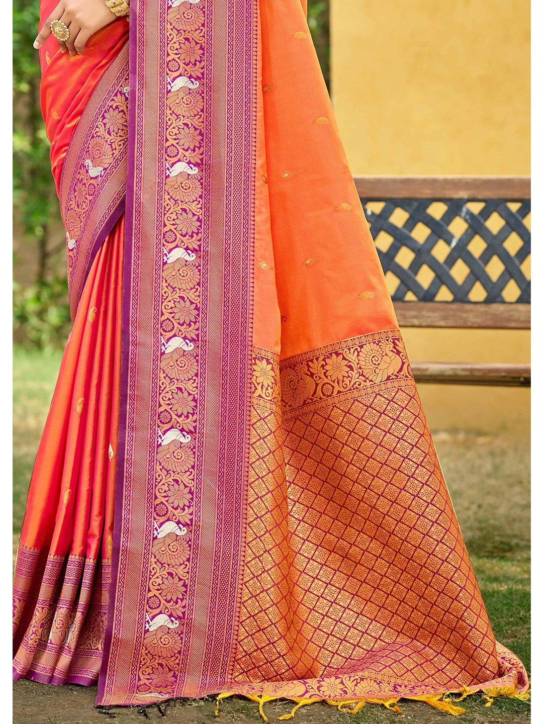 Classic Coral Orange Floral & Peacock Design Zari Woven Silk Blend Saree With Trendy Tassel Pallu